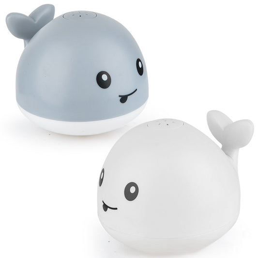 Electric water spouting whale toy