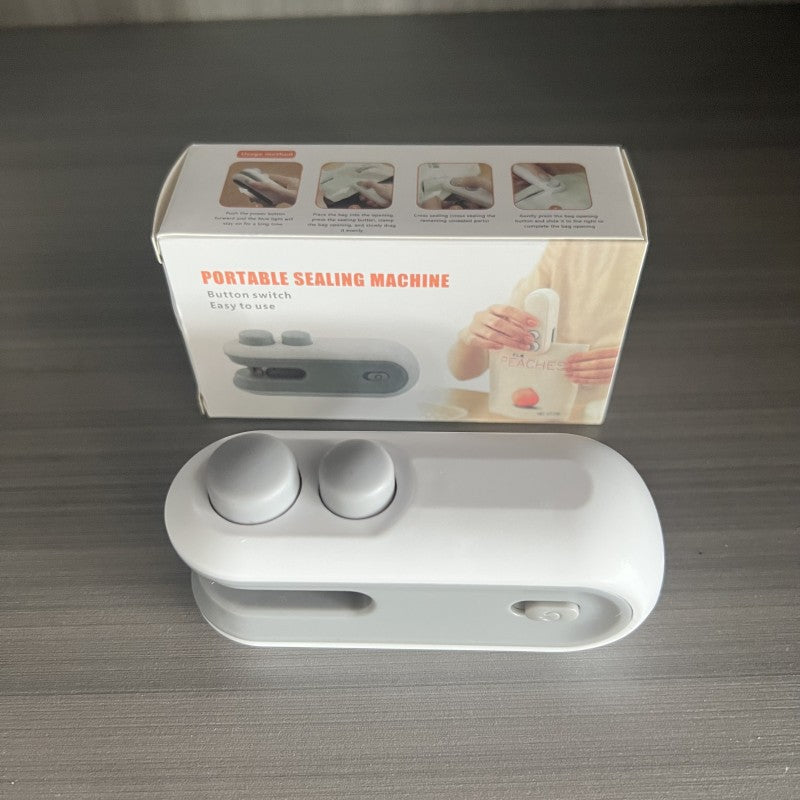 Portable hand-operated pressure-type plastic bag sealing machine
