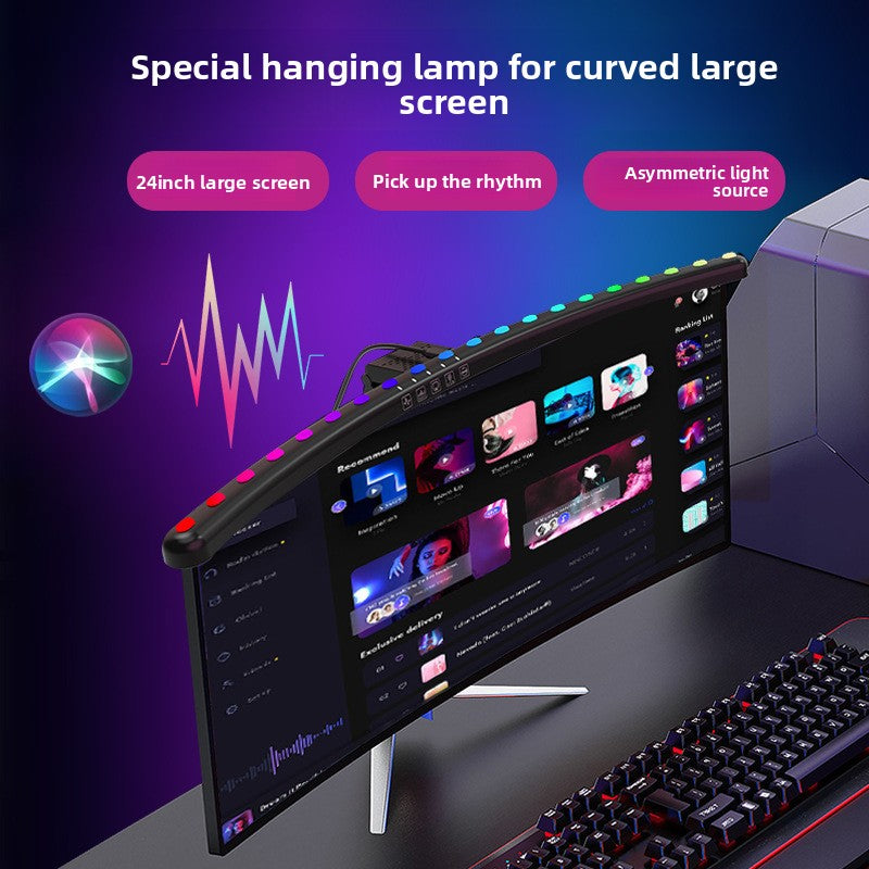 A hanging light on the computer monitor