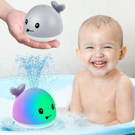 Electric water spouting whale toy