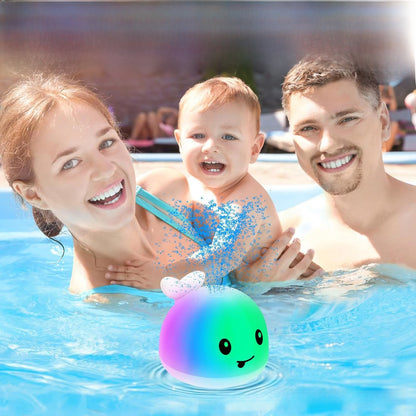 Electric water spouting whale toy